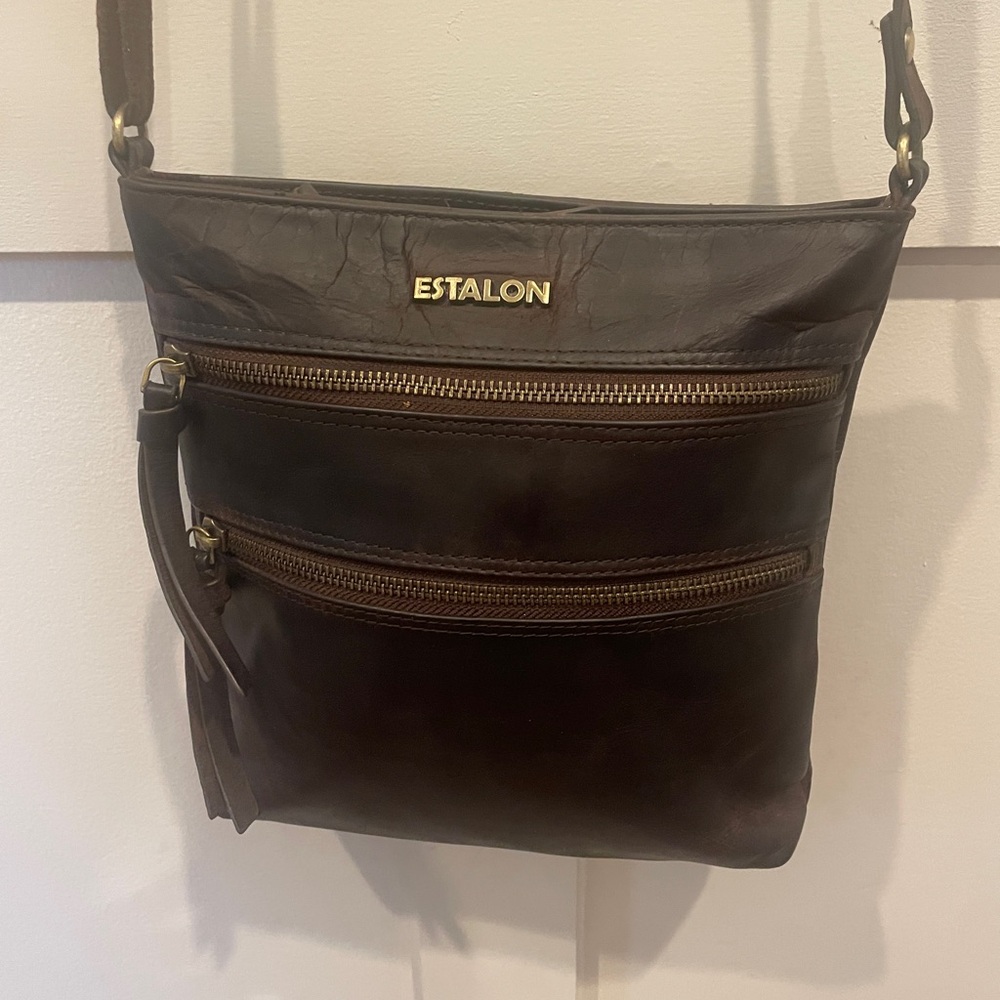 ESTALON Distressed Leather Crossbody Bag with adjustable strap.